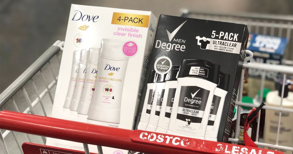 white 4-pack of dove deodorant and black 5-pack of degree men deodorant in child seat portion of costco shopping cart
