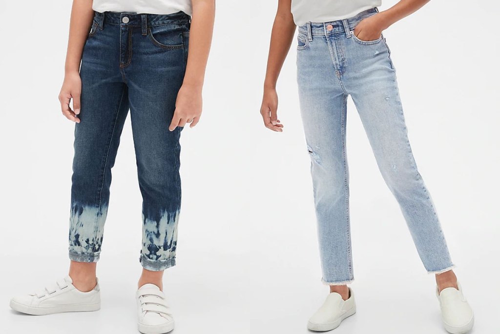 two girls modeling jeans in dark and light wash colors