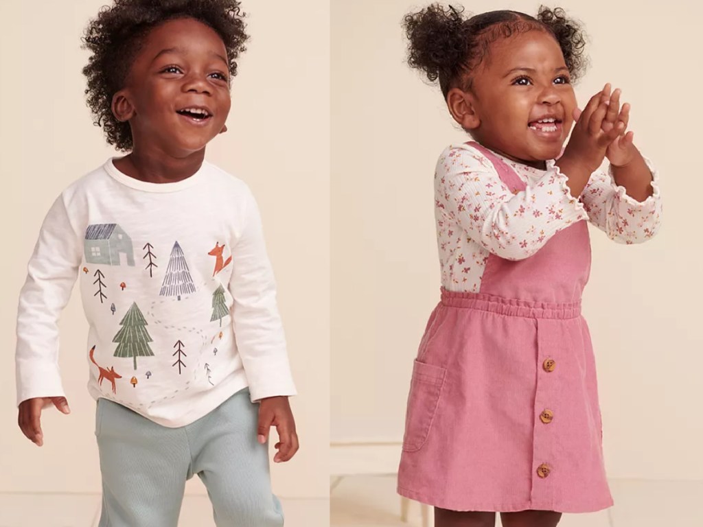 little boy wearing a cream colored tee and a little girl wearing a pink corduroy jumper dress