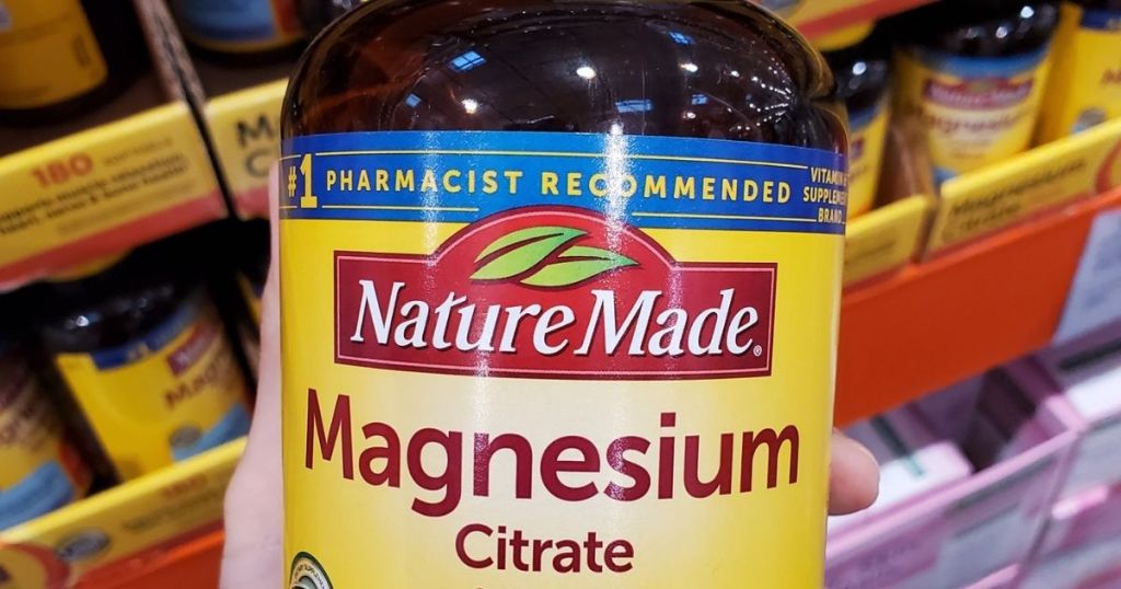 hand holding Nature Made magnesium Citrate in store