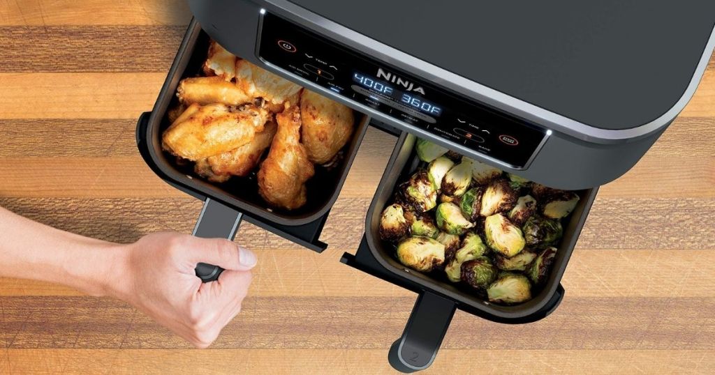 two open baskets of the Ninja Foodi Dual Zone Air Fryer