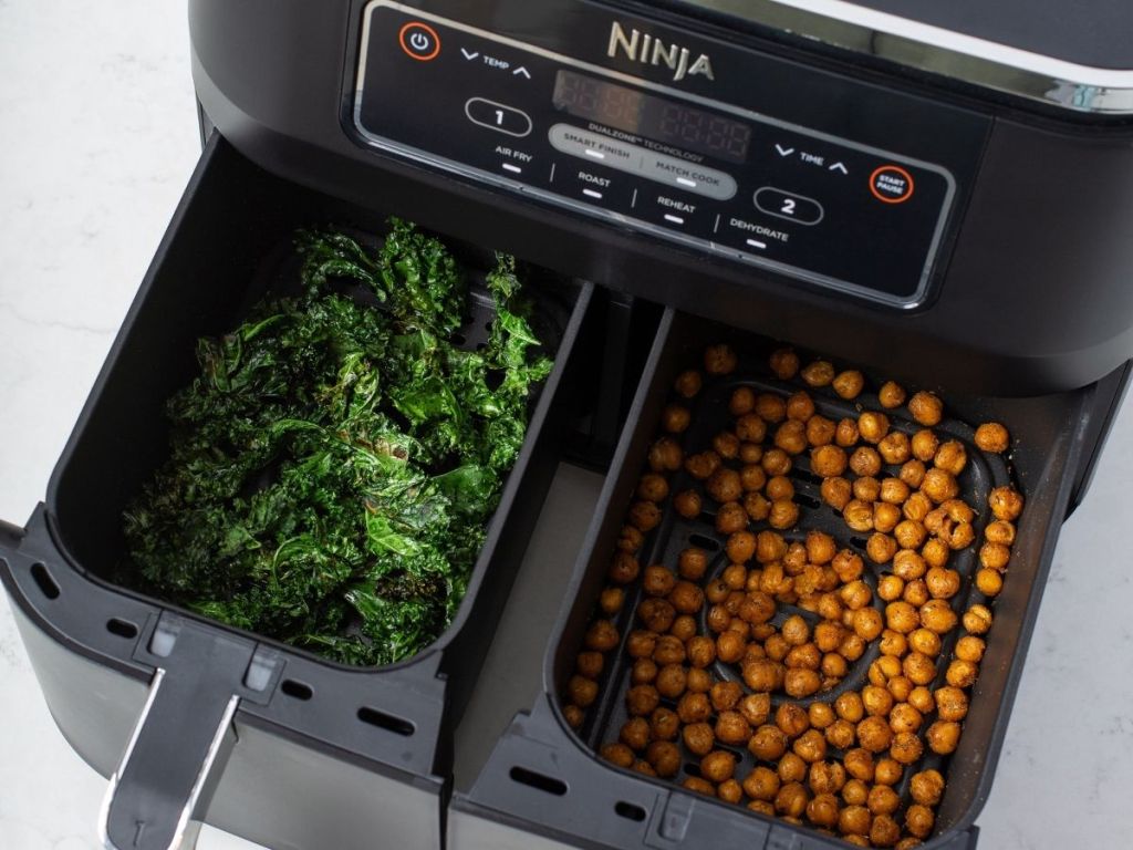 over head basket view of Ninja Foodi Dual Zone Air Fryer with food inside each basket