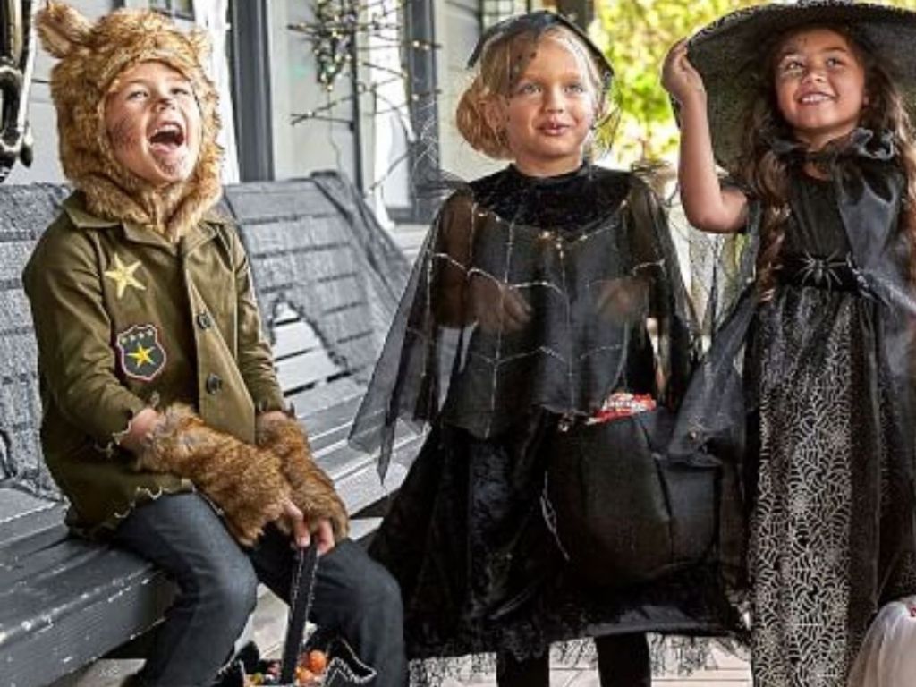 kids dressed in halloween costumes
