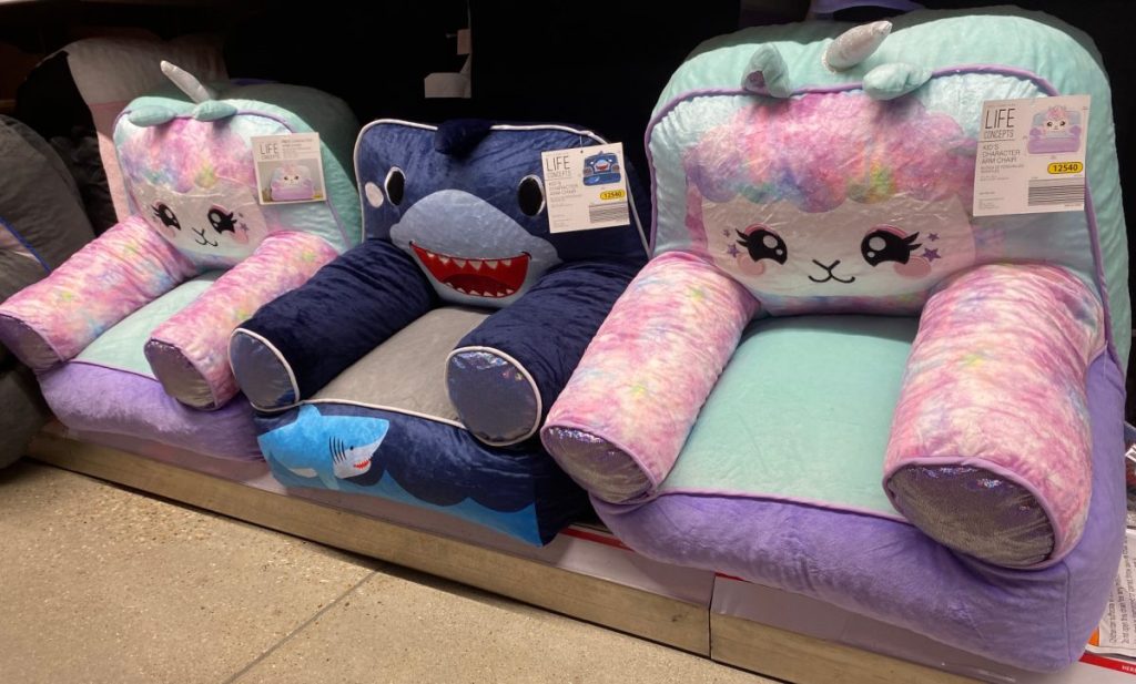 kids unicorn and shark armchairs on store shelf