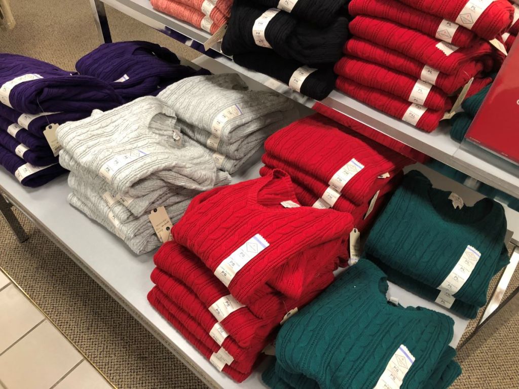 display of sweaters on a table
