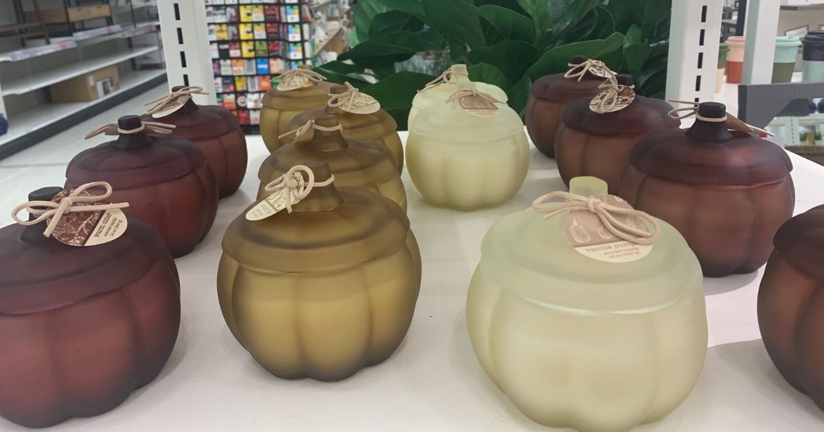 Candles in frosted glass pumpkin shaped jars w/ lid