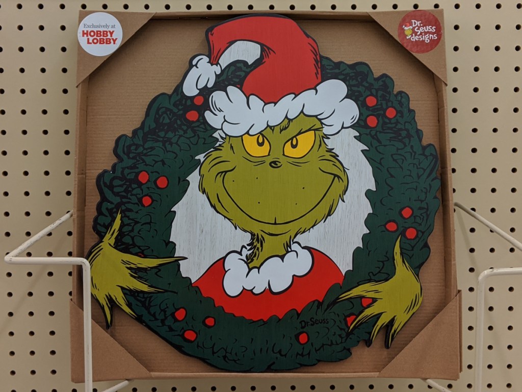 Grinch wreath wall decor in store
