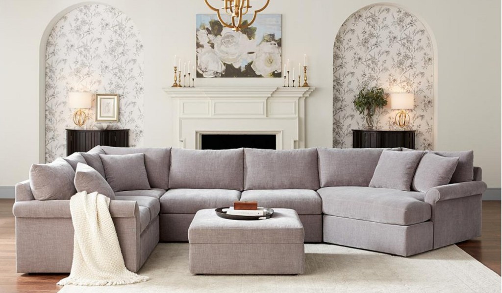 living room with a Wedport 3-Pc. Fabric Sectional Sofa with Armless Apartment Sofa and Chaise