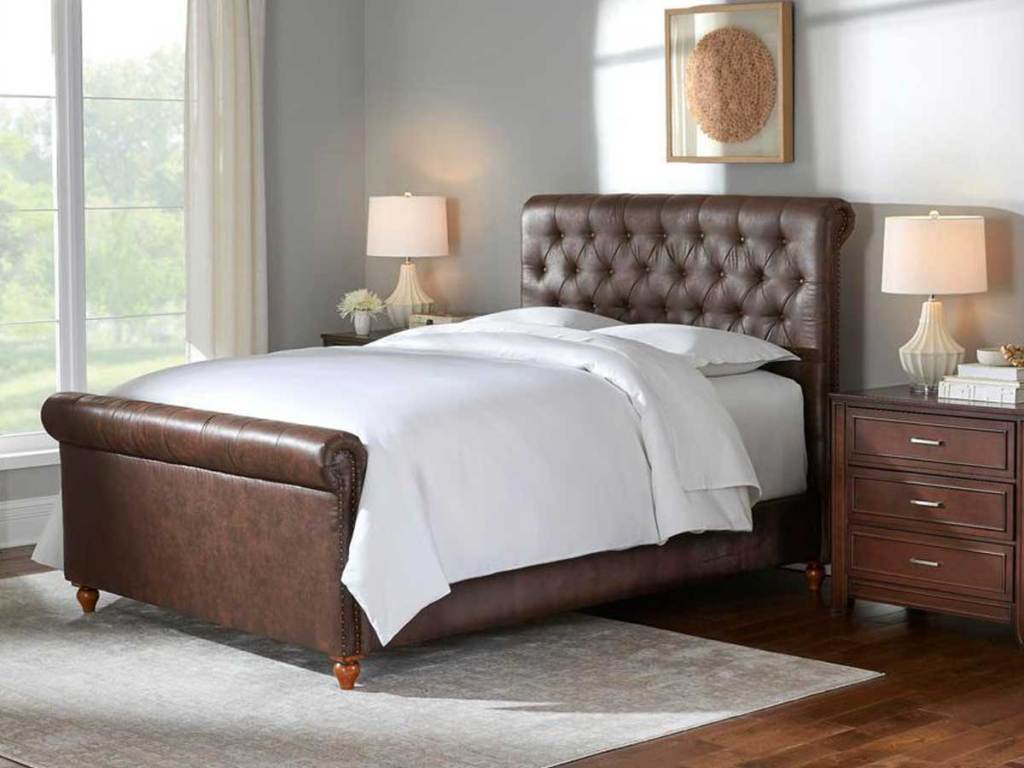 brown leather sleigh bed in bedroom