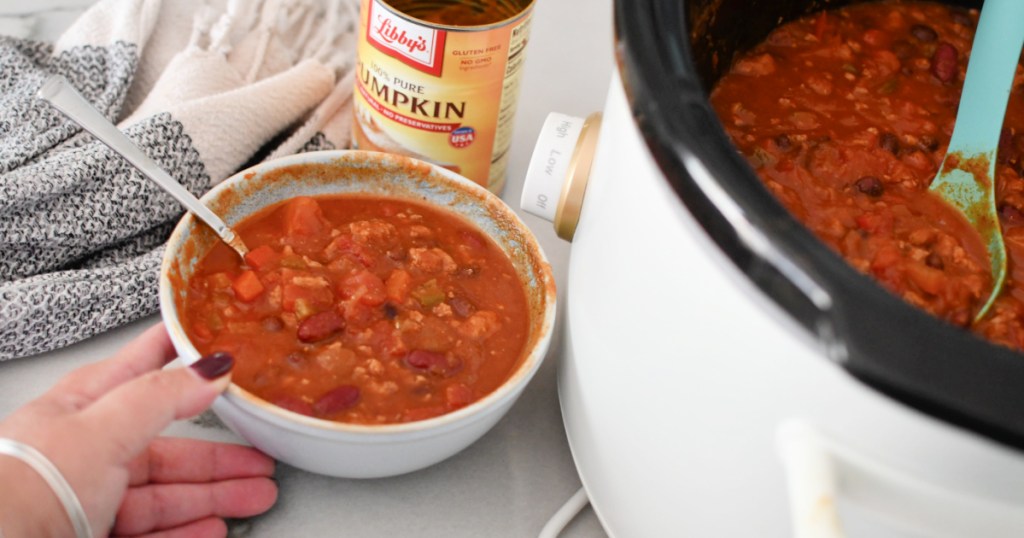 dishing up a bowl of pumpkin turkey