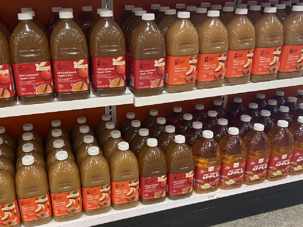 bottles of juice on store shelf