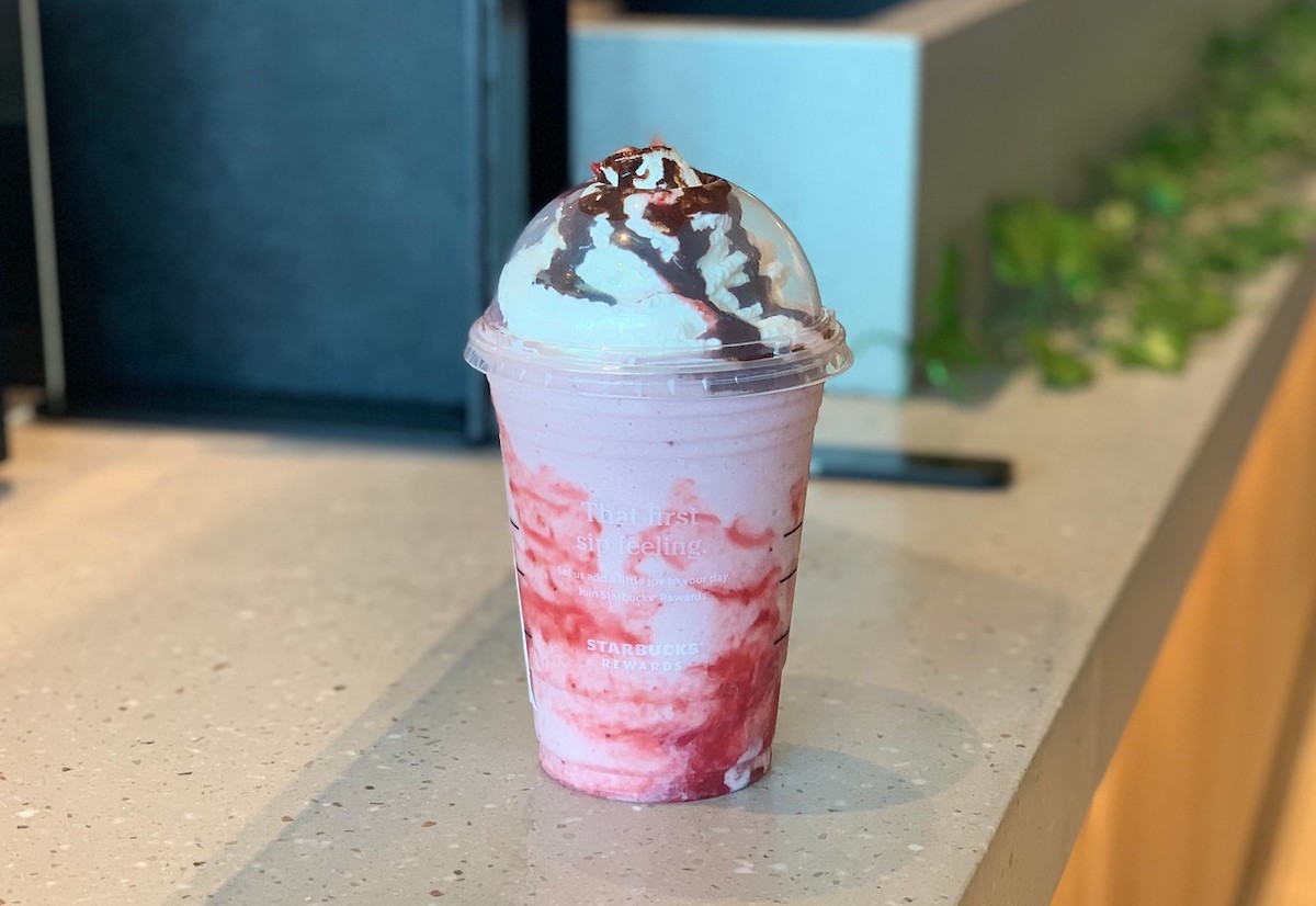 red mary frappuccino sitting on starbucks counter