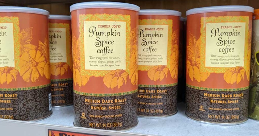 cans of pumpkin spice coffee on store shelf