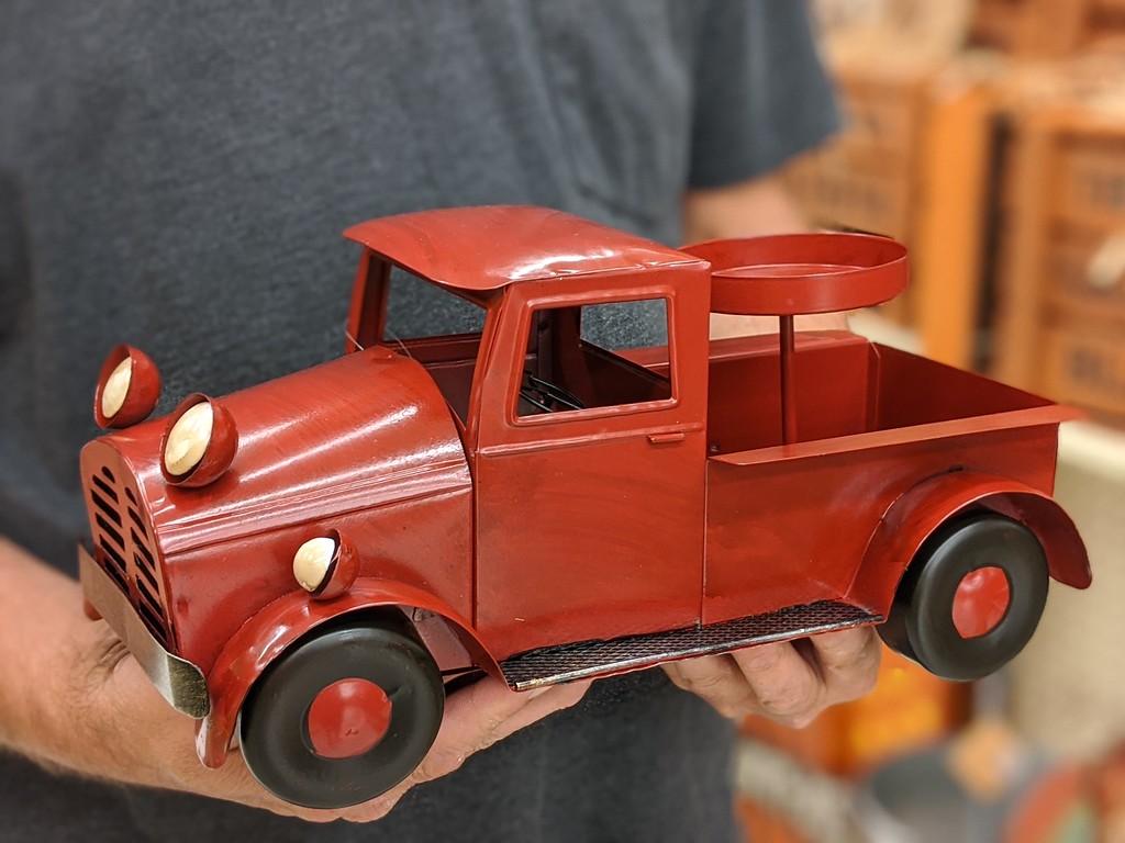 red vintage truck with candle holder at hobby lobby