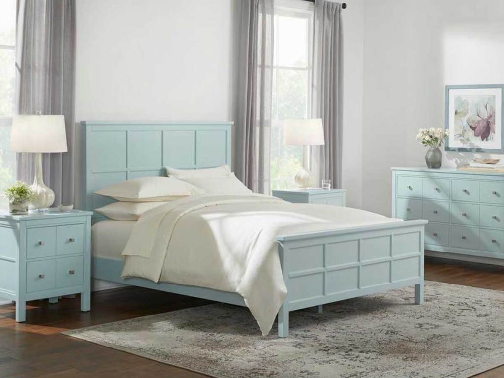 seafoam green bed in bedroom