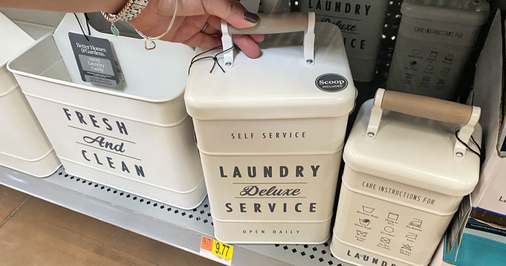 white metal laundry containers and cleaning caddies on walmart shelf