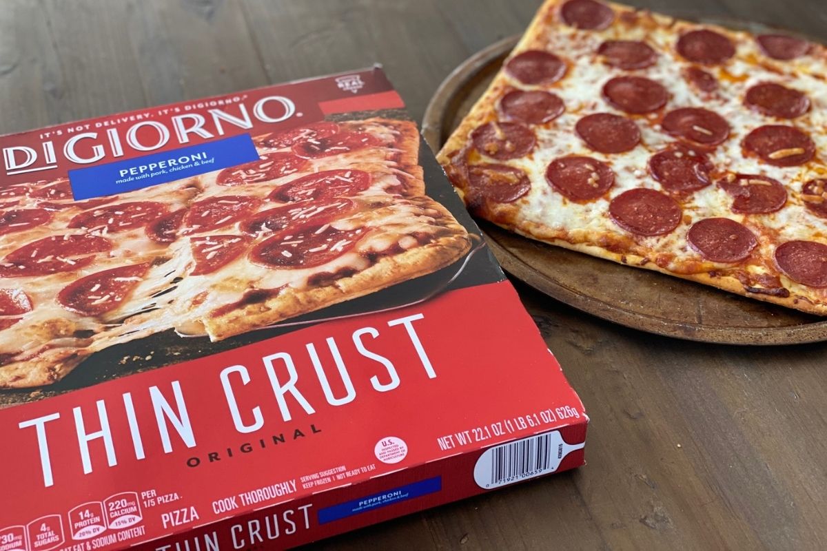 digiorno pizza on a table next to the box