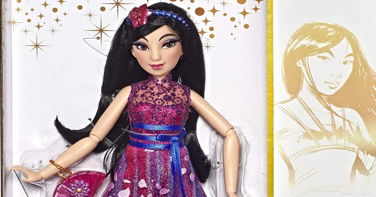 close up of the top have of the Disney Princess Mulan barbie doll with dark hair and a purple dress