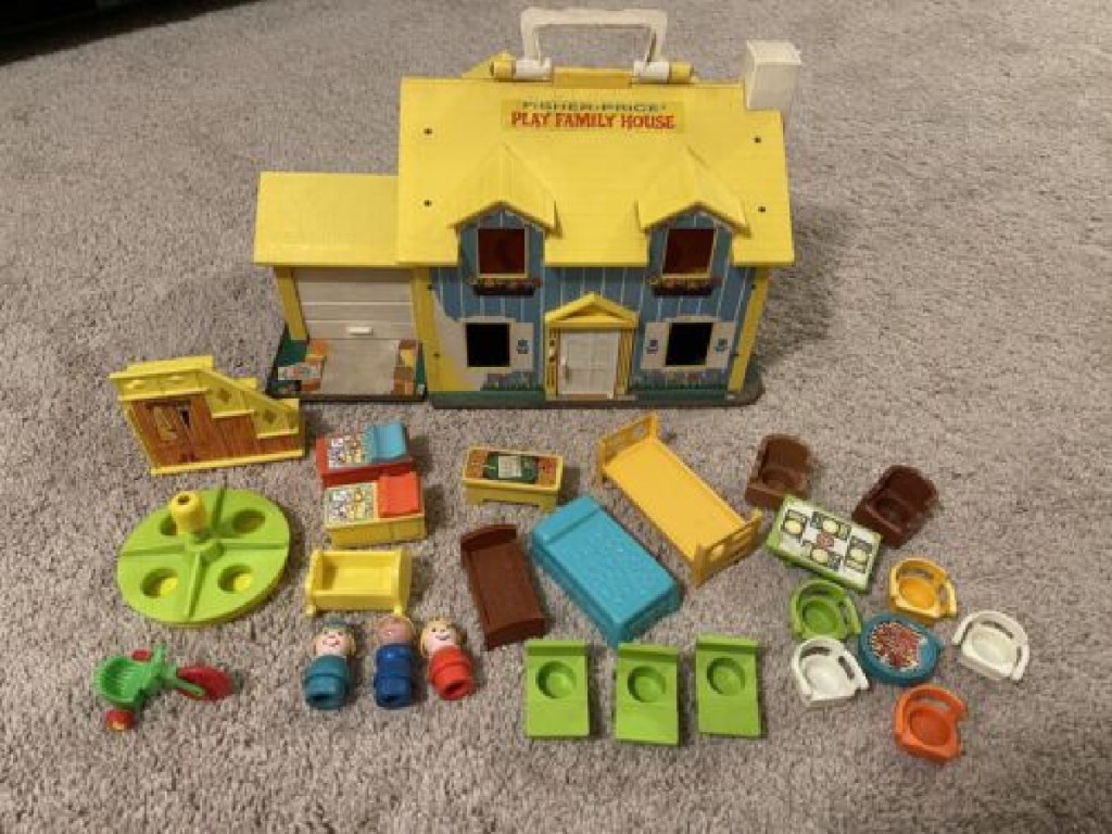 Fisher Price Family Play House and accessories displayed on carpet