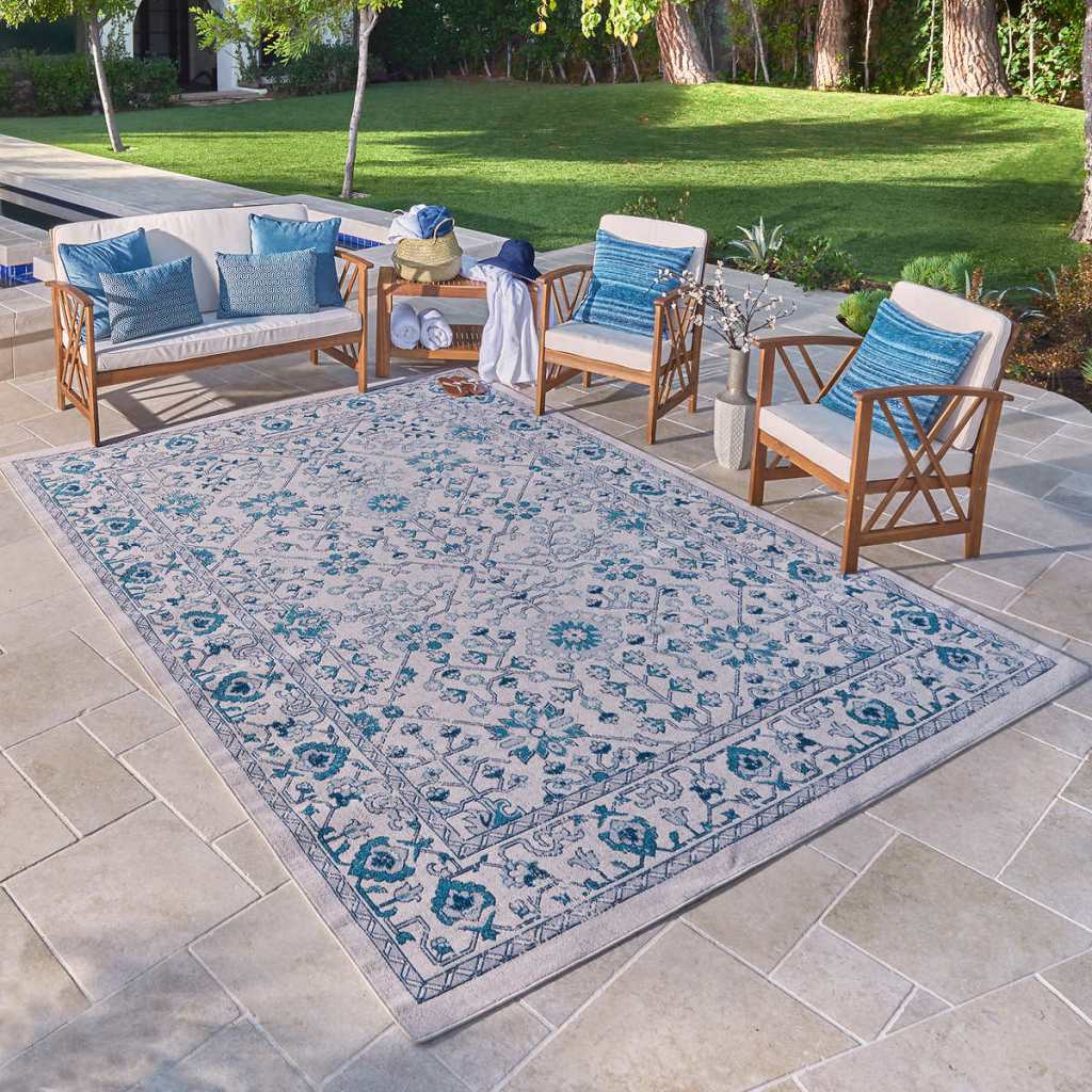 Gatsby Rug shown in patio setting 