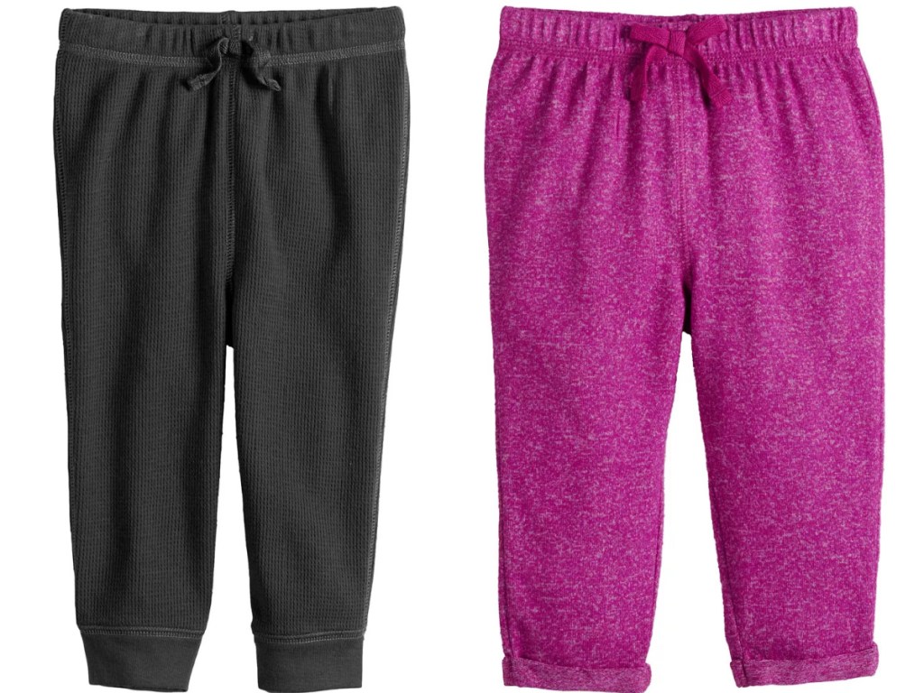 black pair of baby pants and pink pair of baby pants