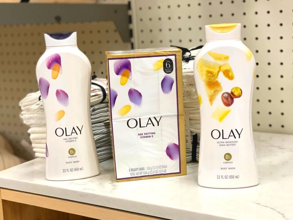 three olay body wash and bar soap