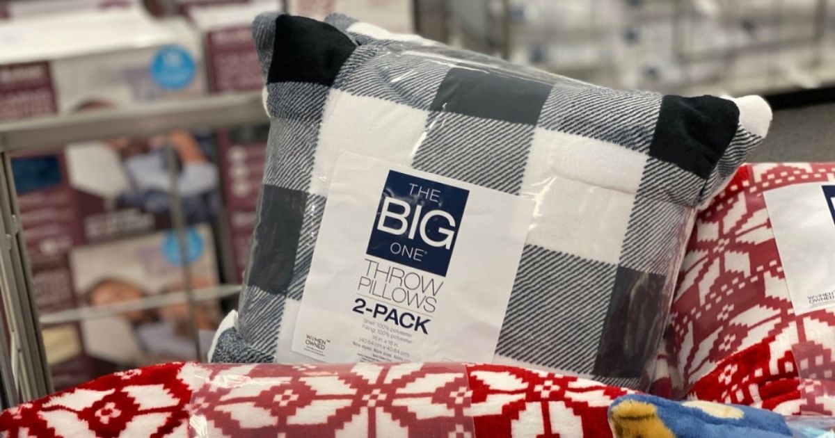 Sets of throw pillows on display in-store