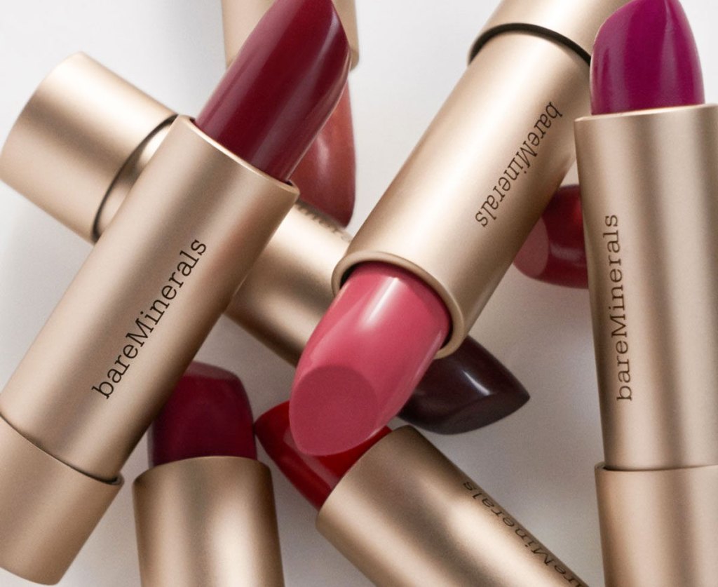 bareMinerals lipsticks in gold tubes in a pile on each other