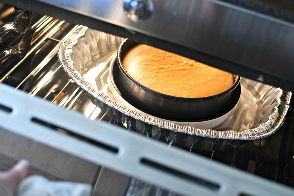 cheesecake cooling in the oven after cooking