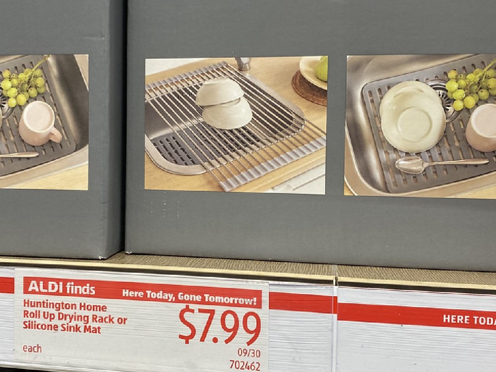 store shelf with boxes of kitchen gadgets 