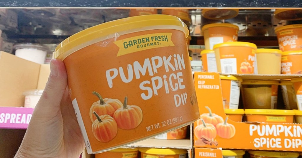 holding pumpkin spice dip at Costco