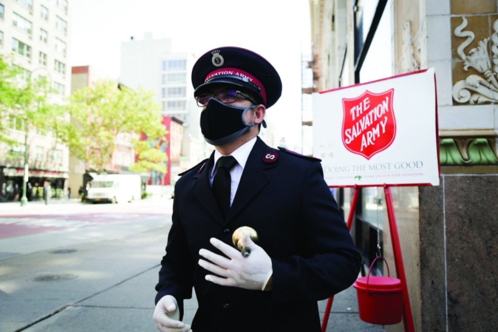 man ringing bell for Salvation Army