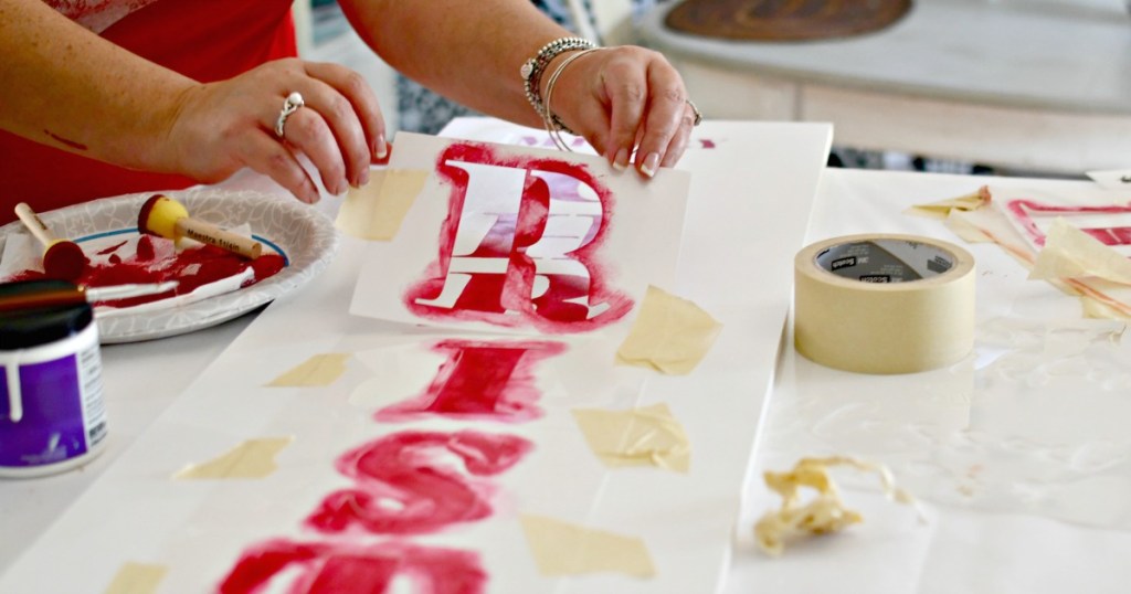 stenciling a porch sign for christmas