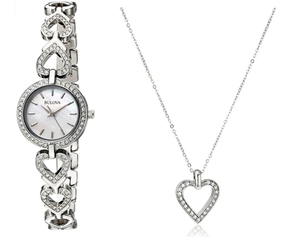 silver watch with crystals and a watch band made of hearts plus a matching crystal heart necklace next to it