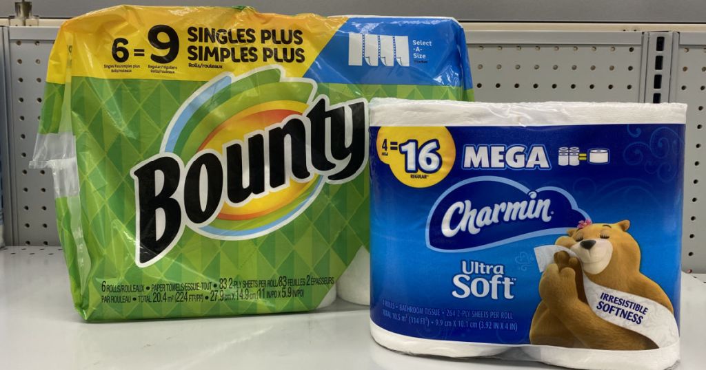 Paper towels and toilet paper on shelf 
