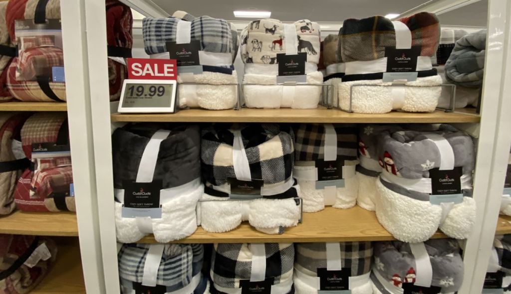 display of Cuddl Duds blankets at Kohl's