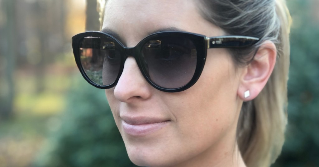 woman wearing black fossil sunglasses