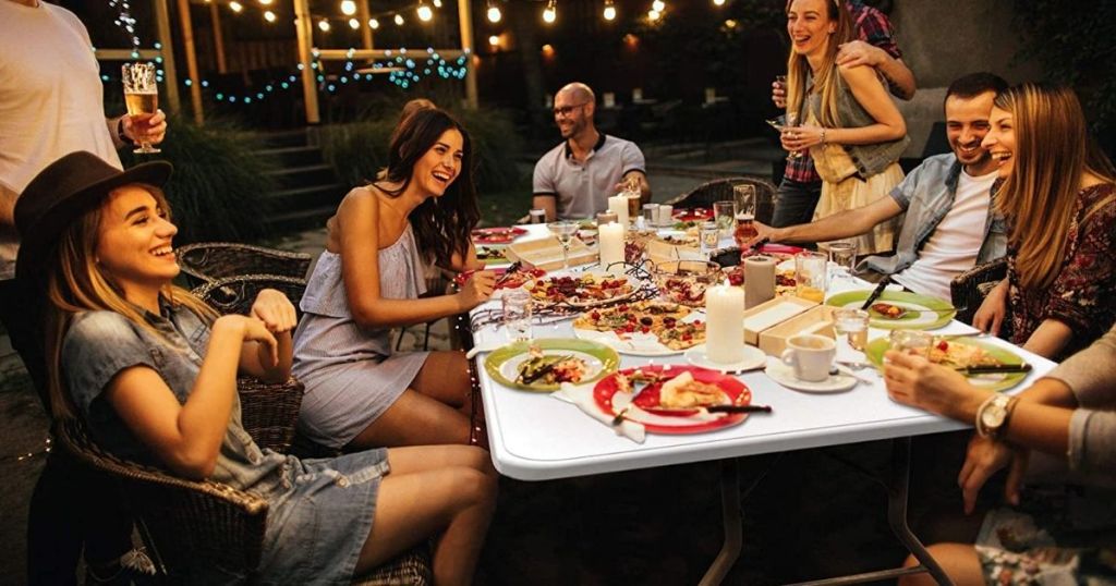 group of people sitting around a table