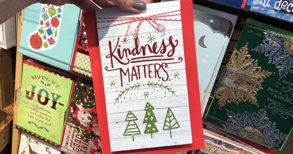 Hallmark Christmas card in woman's hand