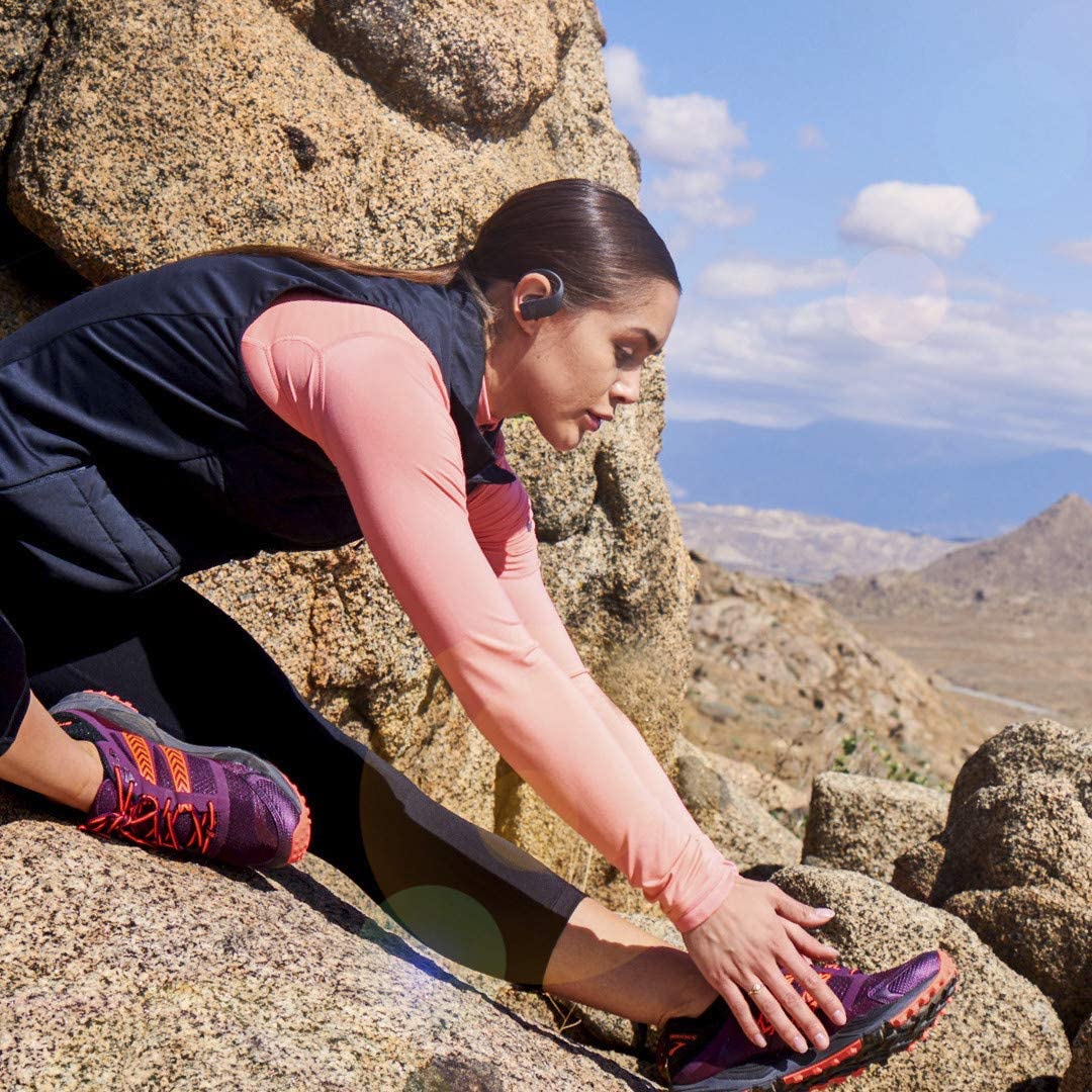 Woman wearing JBL Endurance Peak Headphones