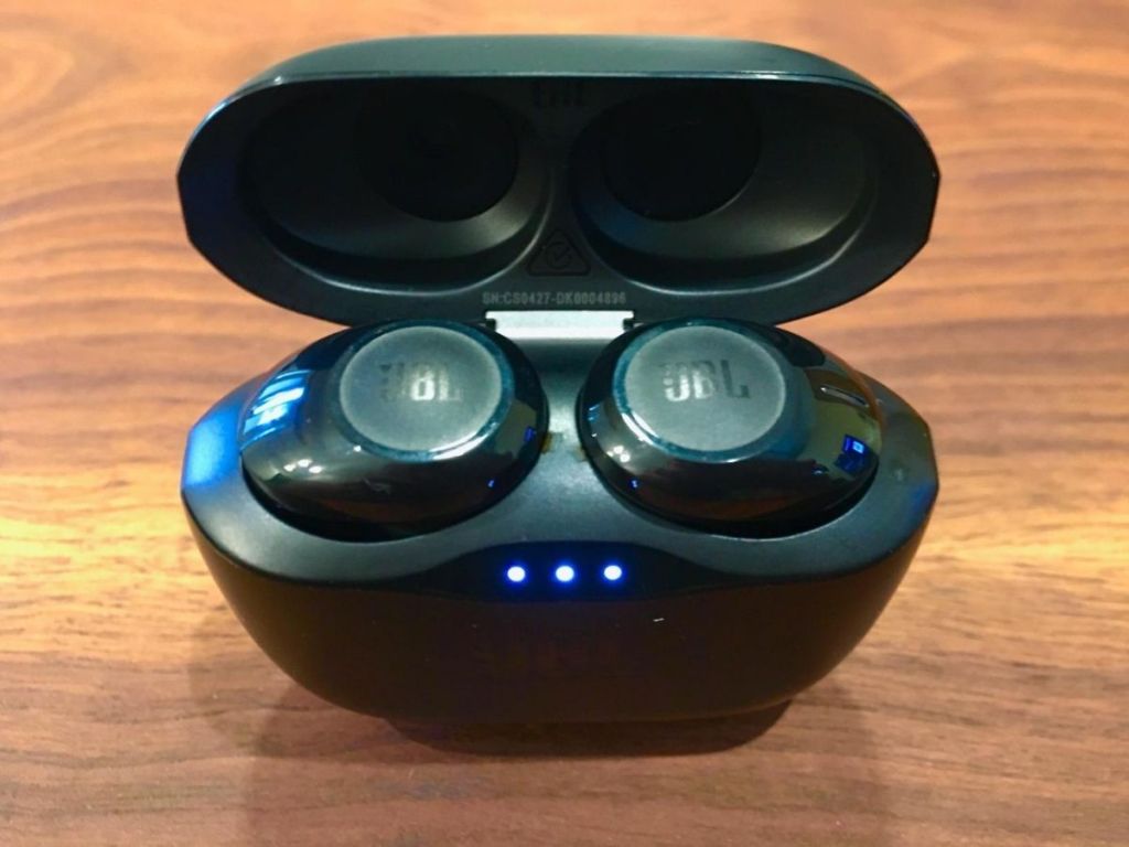 wireless ear buds on counter