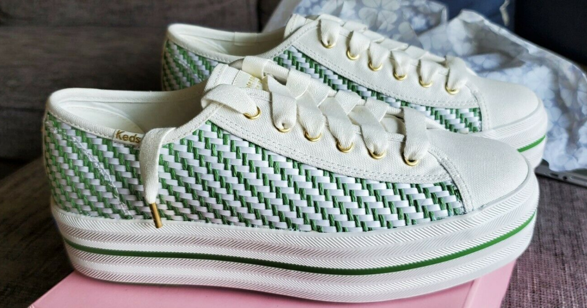 women's green and white woven stripe sneakers on pink shoe box