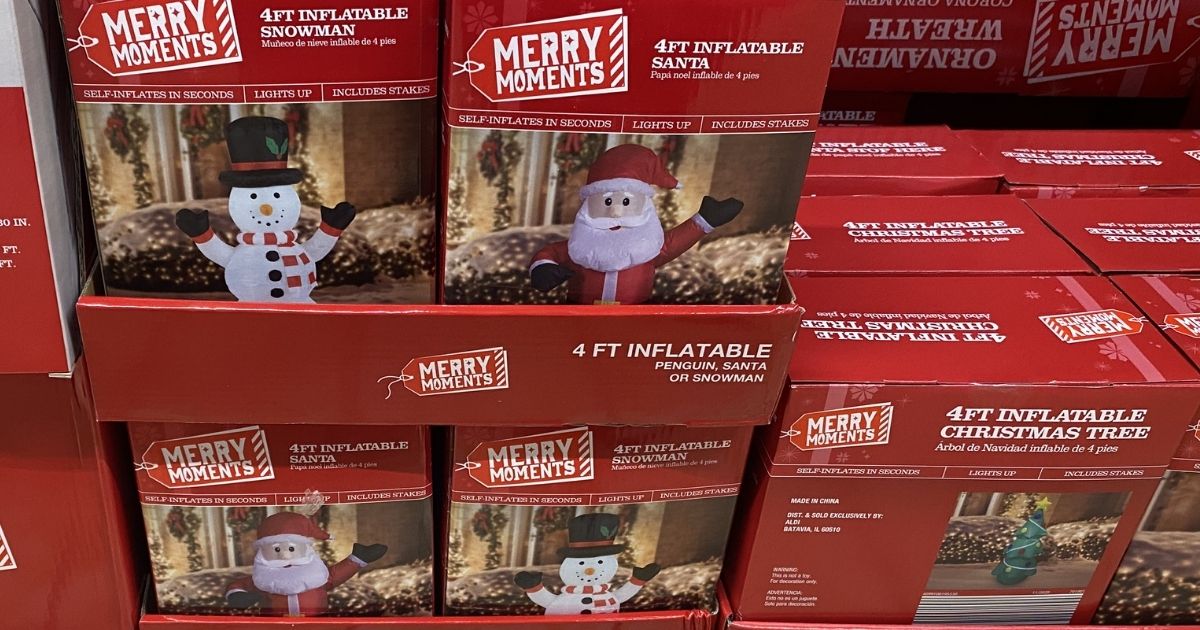 boxes of Christmas inflatables on display at ALDI