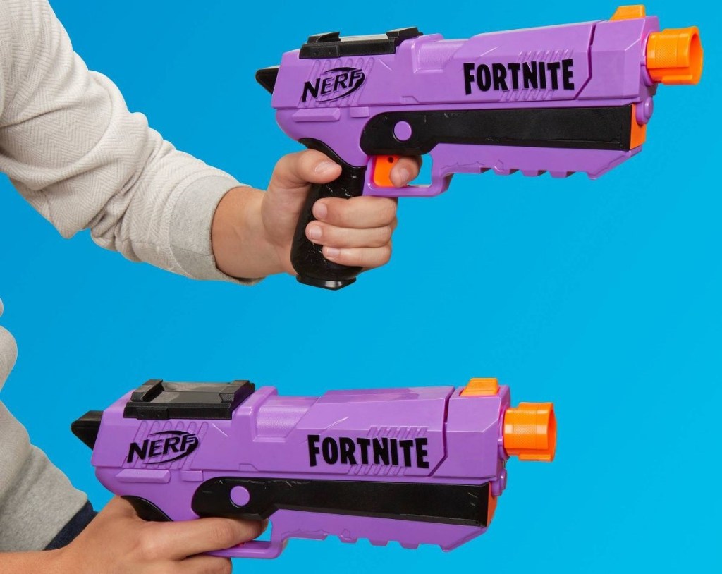 hands holding NERF Blasters
