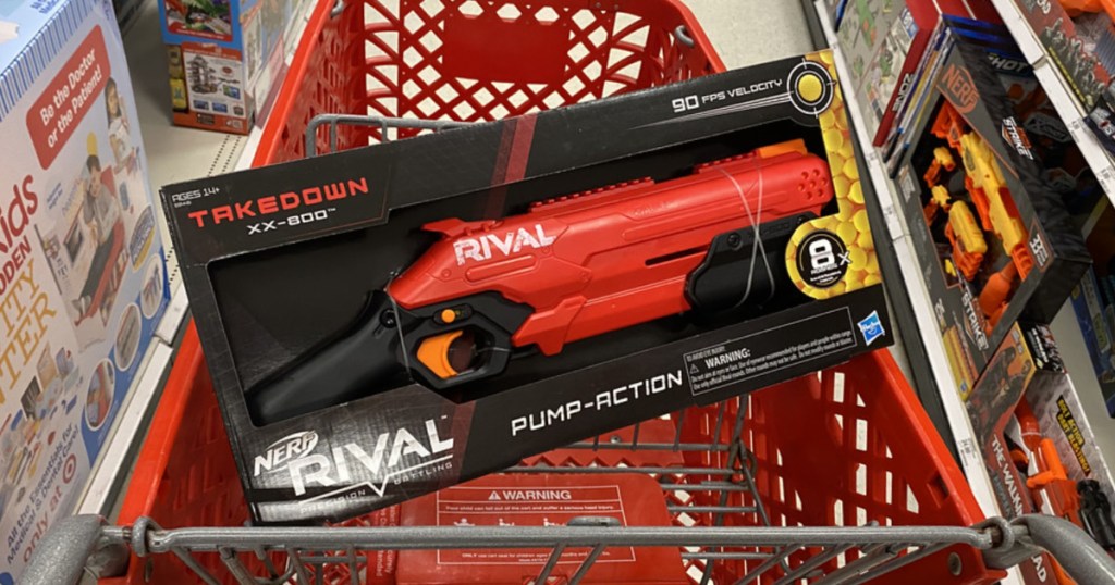 red toy blaster in store cart