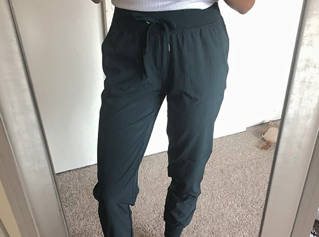 girl wearing green joggers 