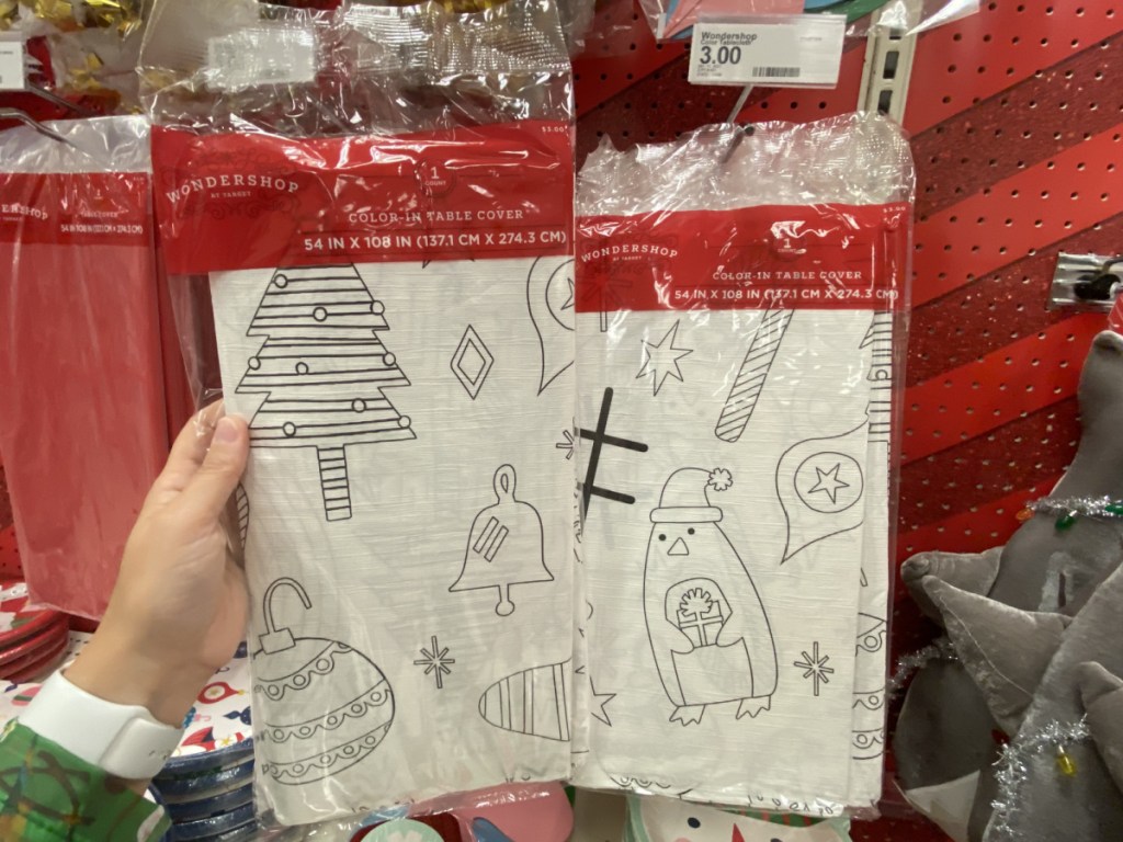 hand holding a color in table cover in store at target 