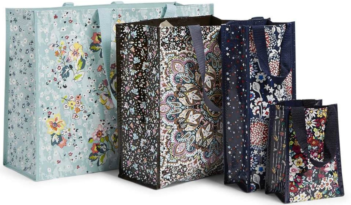 Four reusable tote bags in various sizes