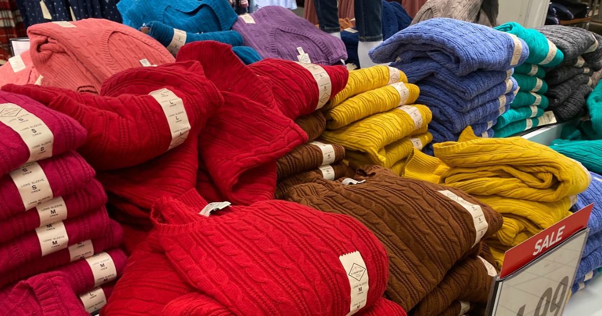 pile of Women's Sweaters on display in a JCPenney store