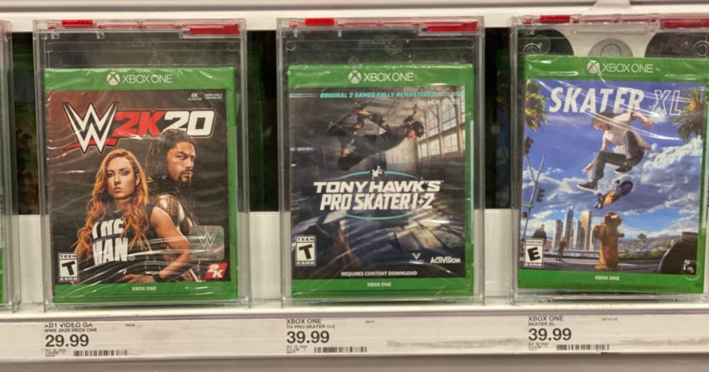 three xbox games on shelf 